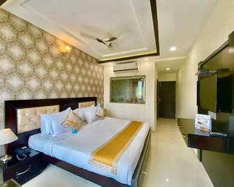 Green by One Hotels - Rishikesh - Bedroom