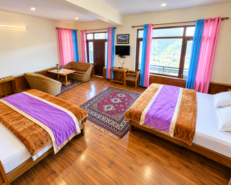 Goroomgo Vijay Mount View Resort Munsyari - Munsyari - Bedroom