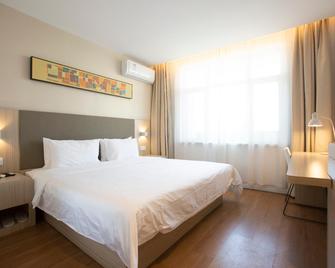 Hanting Hotel Qinhuangdao Nandaihe Tourism Center - Qinhuangdao - Habitación