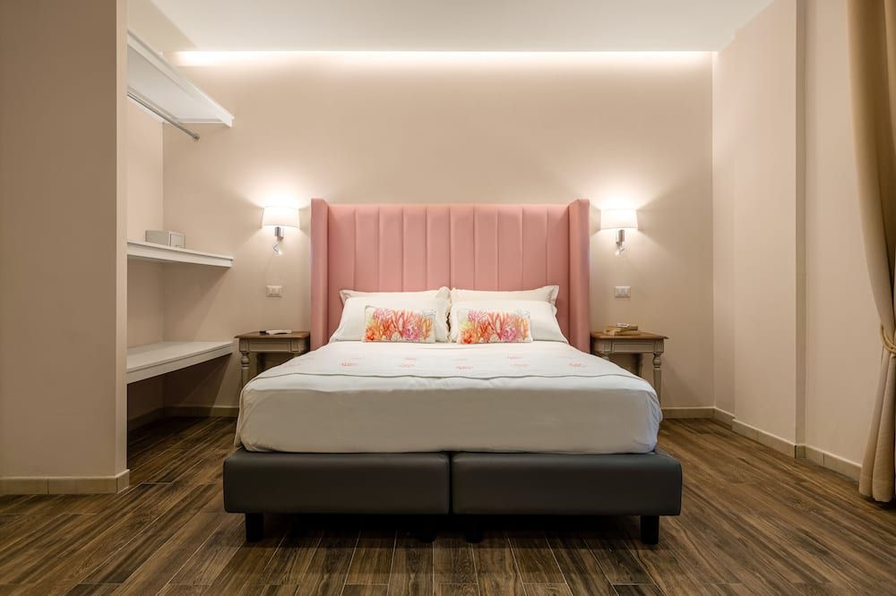 أوندا سويت - كاغلياري - غرفة نوم