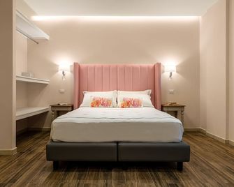 أوندا سويت - كاغلياري - غرفة نوم