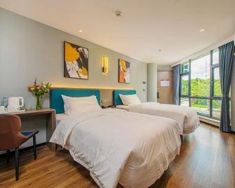 Jingyue Hotel (Zhuhai Gongbei Port Xiawan Road) - Zhuhai - Bedroom