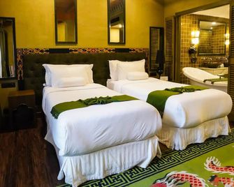 دروك هوتل - ثيمفو - غرفة نوم