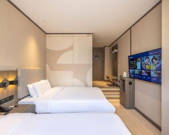 Hanting Hotel Jiuquan Changxing Electric Market - Jiuquan - Slaapkamer