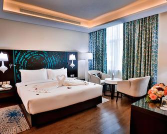 Signature Hotel Al Barsha - Dubai - Bedroom