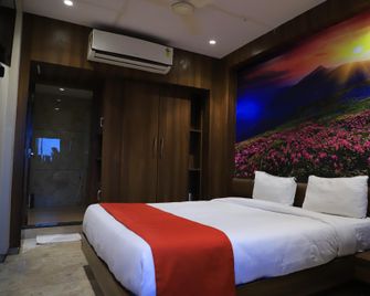 J.D Hotel - Surat - Schlafzimmer