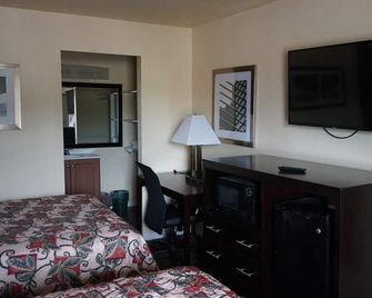Village Motor Inn - Austin - Habitación