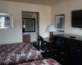 Village Motor Inn - Austin - Habitación