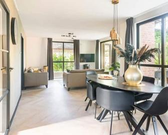 Coco Wellness Bungalow - Slijk-Ewijk - Comedor
