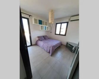 Joli T2 dans résidence avec parking - Biguglia - Sala de estar