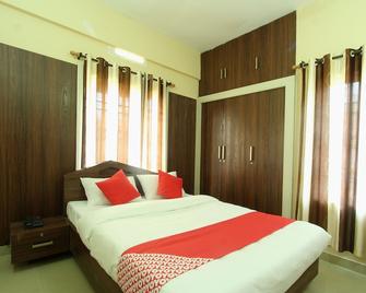 Oyo 22514 Live Inn - Siddapur - Bedroom