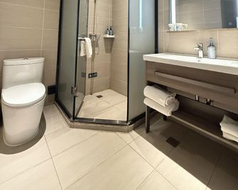 Hanting Hotel Tianjin Jinnan Development Zone National Exhibition Center - Tianjin - Bedroom