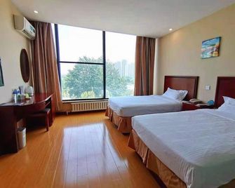 Greentree Inn Shandong Qingdao Jiaozhou Sanlihe Park Express Hotel - Qingdao - Habitación