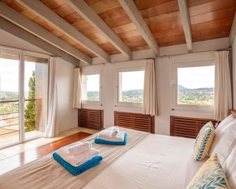 Can Cota Suites & Spa - Turismo de interior - Selva - Ložnice