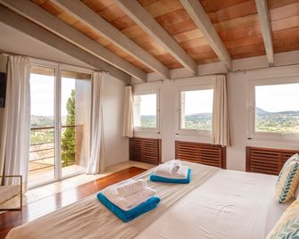 Can Cota Suites & Spa - Turismo de interior - Selva - Schlafzimmer