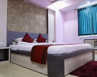 M S Hotel - Bhāgalpur - Bedroom