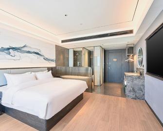Weiting Hotel - Tianjín - Habitación