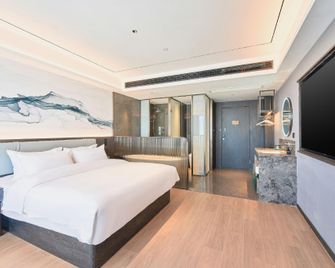 Weiting Hotel - טיאנג'ין - חדר שינה