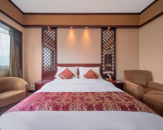 Nenghui Hotel - Guiyang - Schlafzimmer