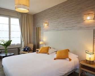 لوجي أوتل مارجوريت - أورليون - غرفة نوم