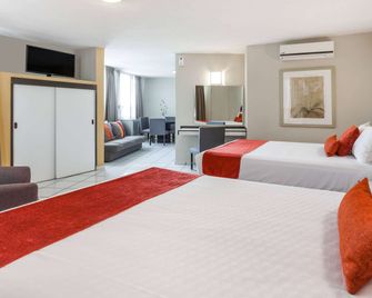 Howard Johnson by Wyndham Guanajuato Leon Avenida - לאון - חדר שינה