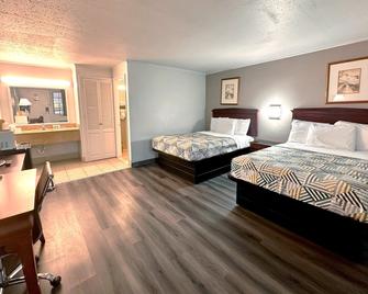 Red Carpet Inn - Stamford - Stamford - Bedroom
