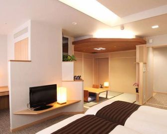 Hotel Plaza Geihin - Yokote - Спальня