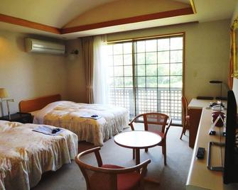 Hotel Kosaka Gold Palace - Kosaka - Slaapkamer