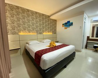 Inout Hotel Pangandaran - Pangandaran - Schlafzimmer