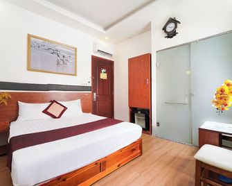 Collection O Eva Hotel District 8 Near Ben Thanh Market - Ho Chi Minh Ville - Chambre