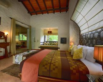 Paatlidun Safari Lodge - Rāmnagar - Bedroom