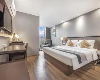 Home Inn (Neijiang Wanda Plaza) - Neijiang - Schlafzimmer