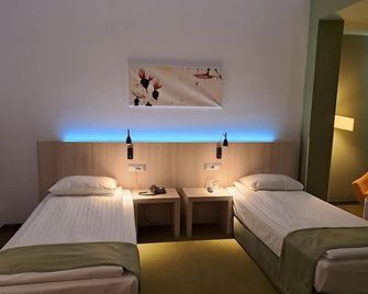 Hotel Armatti - בראסוב - חדר שינה