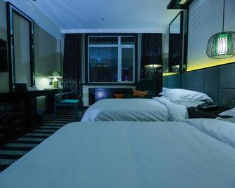 Qianyuan Xiangyu Hotel - Yanbian - Bedroom