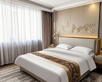 Beiguo Zhichun Business Hotel - Hulunbuir - Bedroom