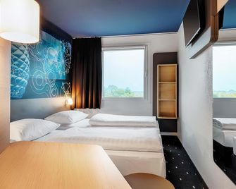 B&B Hotel München-Garching - Garching - Slaapkamer
