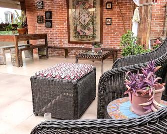 Boutique Hotel Casa Teatro - מאנואס - פטיו