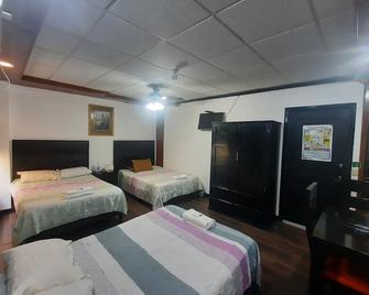Garcias Suites y Hotel - Linares - Bedroom