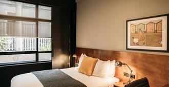 King And Queen Hotel Suites - ניו פלימאות' - חדר שינה