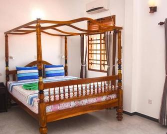Ravi Villa Hikkaduwa - Hikkaduwa - Habitación