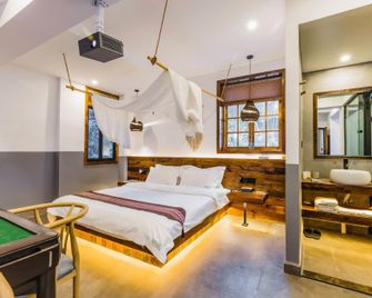 Changsha April 3 Mountain View Terrace Homestay (Yuelushan Hunan University) - צ'נגשה - חדר שינה