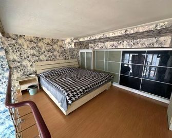 Zihan Holiday Apartment Hotel - Shenyang - Bedroom