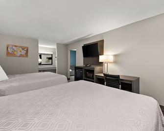 Econo Lodge Inn & Suites - לארדו - חדר שינה