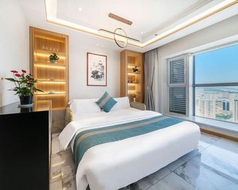 Yinshi Shiguang Homestay (Weihai Hanlefang Railway Station) - Weihai - Chambre