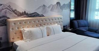 Xiamen Landscape Neegeen Hotel - שיאמן - חדר שינה