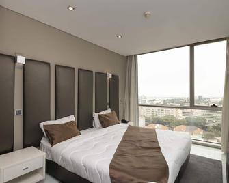 Rk Suite Hotel - Луанда - Спальня