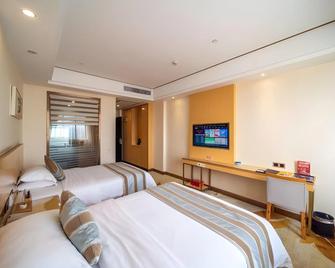 Greentree Alliance Foshan West Station Luowu Road Hotel - Foshan - Habitación