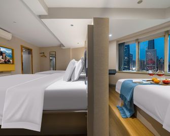 7 Days Premium·Chongqing Guanyinqiao Pedestrian Street Light Rail Station - Chongqing - Habitación