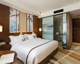 Hebe Xiyue Hotel (Loudi Guanjia Nao) - Loudi - Bedroom