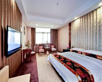 Nanning Universal International Hotel - Nanning - Habitación